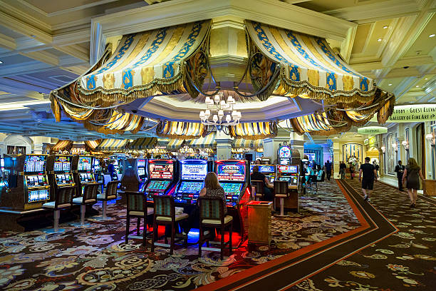 Live dealer in lapakcuan studio setting up blackjack table